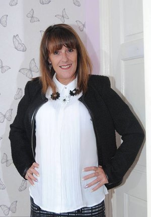 1 dark haired female tortures another during lezdom play in concrete cellar